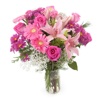 pink lilies roses and gerberas
