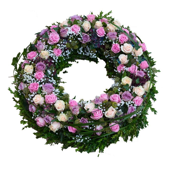 funeral wreath with pink and purple roses