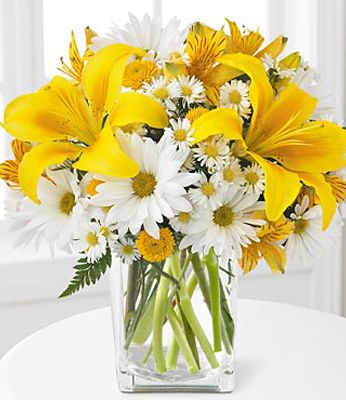 yellow lilies and daisies